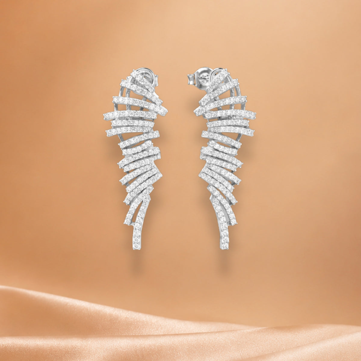 Nova feather glow earrings